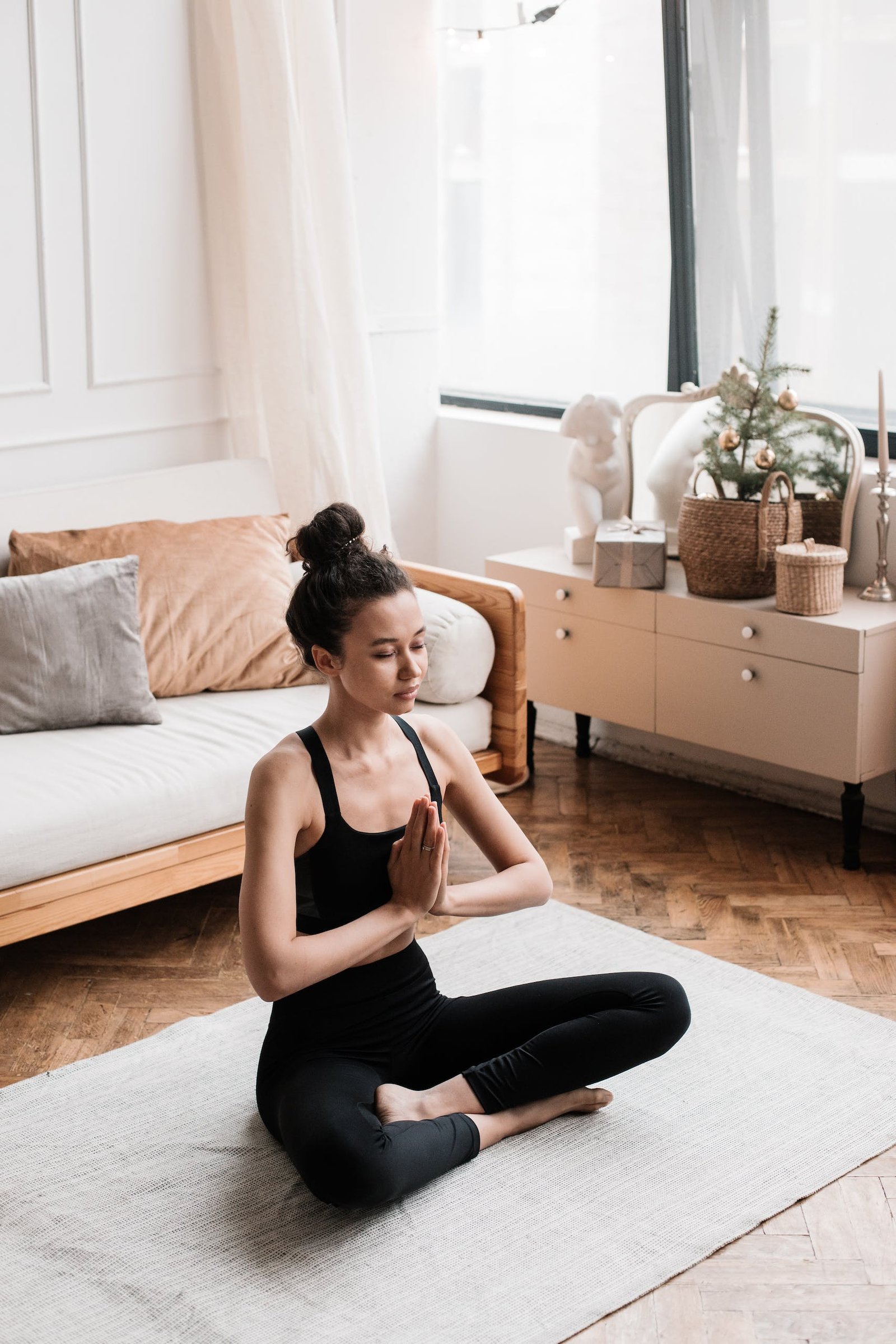 Woman Meditating at Home